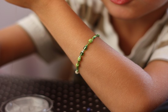 Petitou aime les perles vertes